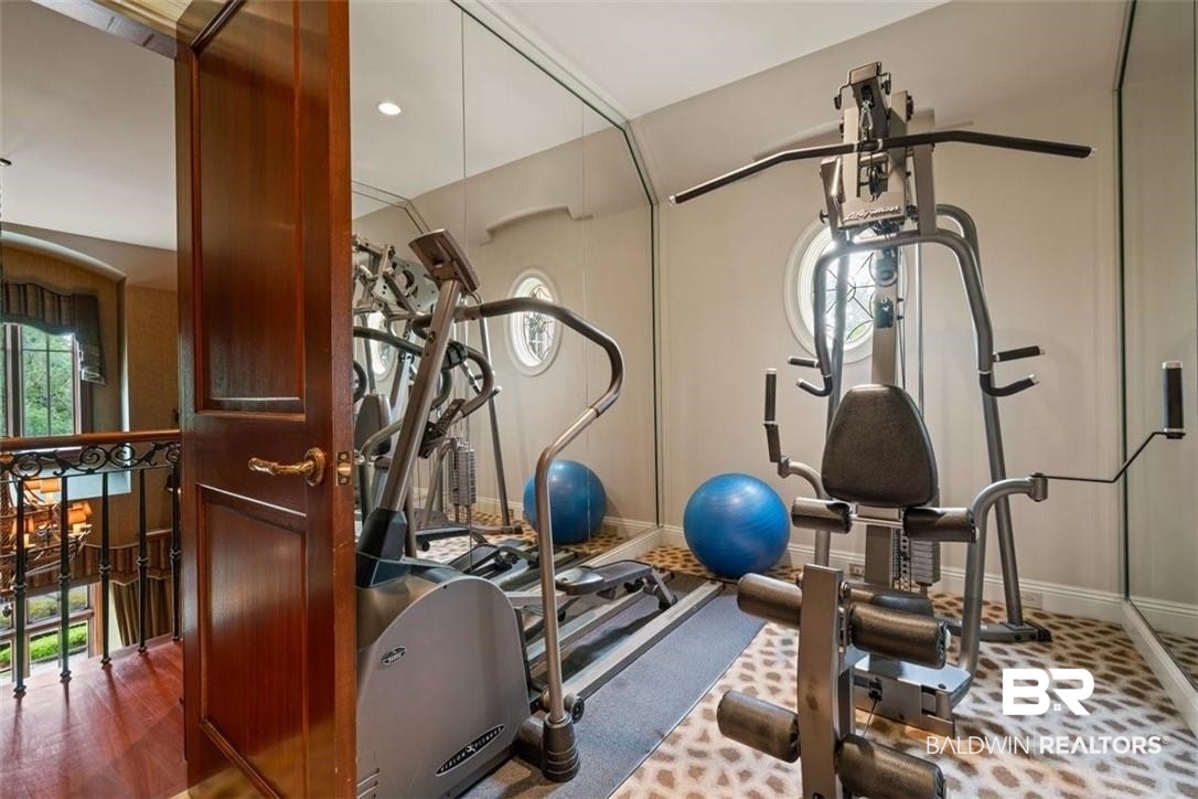4 Chancery Court Mobile, AL 36608 - Photo 30 of 54 Workout area with hardwood / wood-style floors