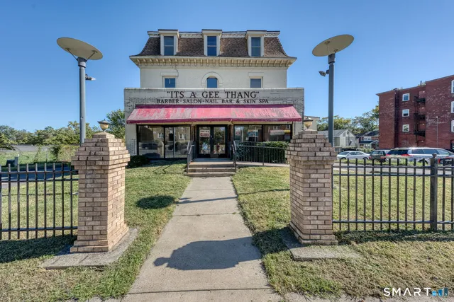 a view of a building with a porch
