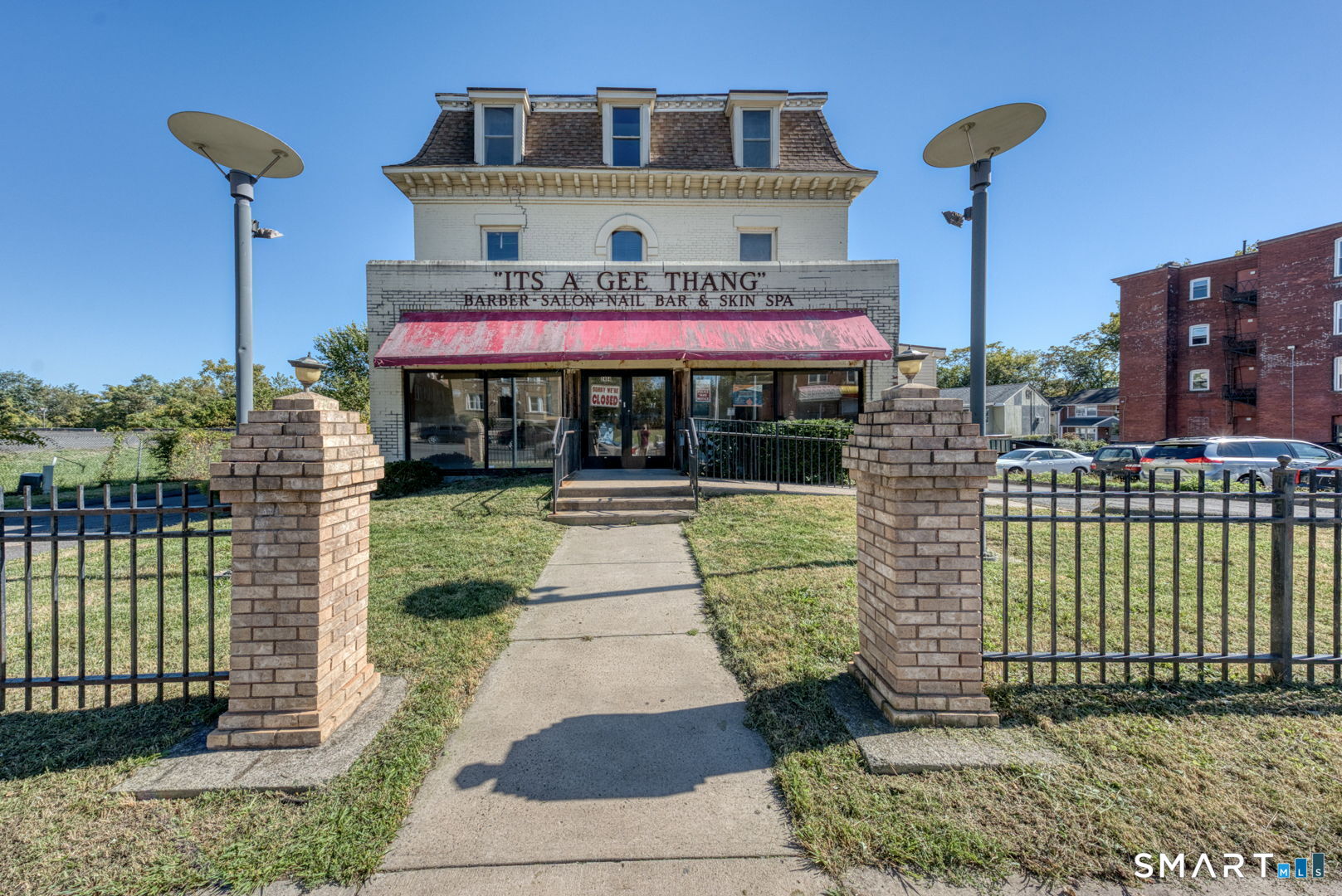 a view of a building with a porch