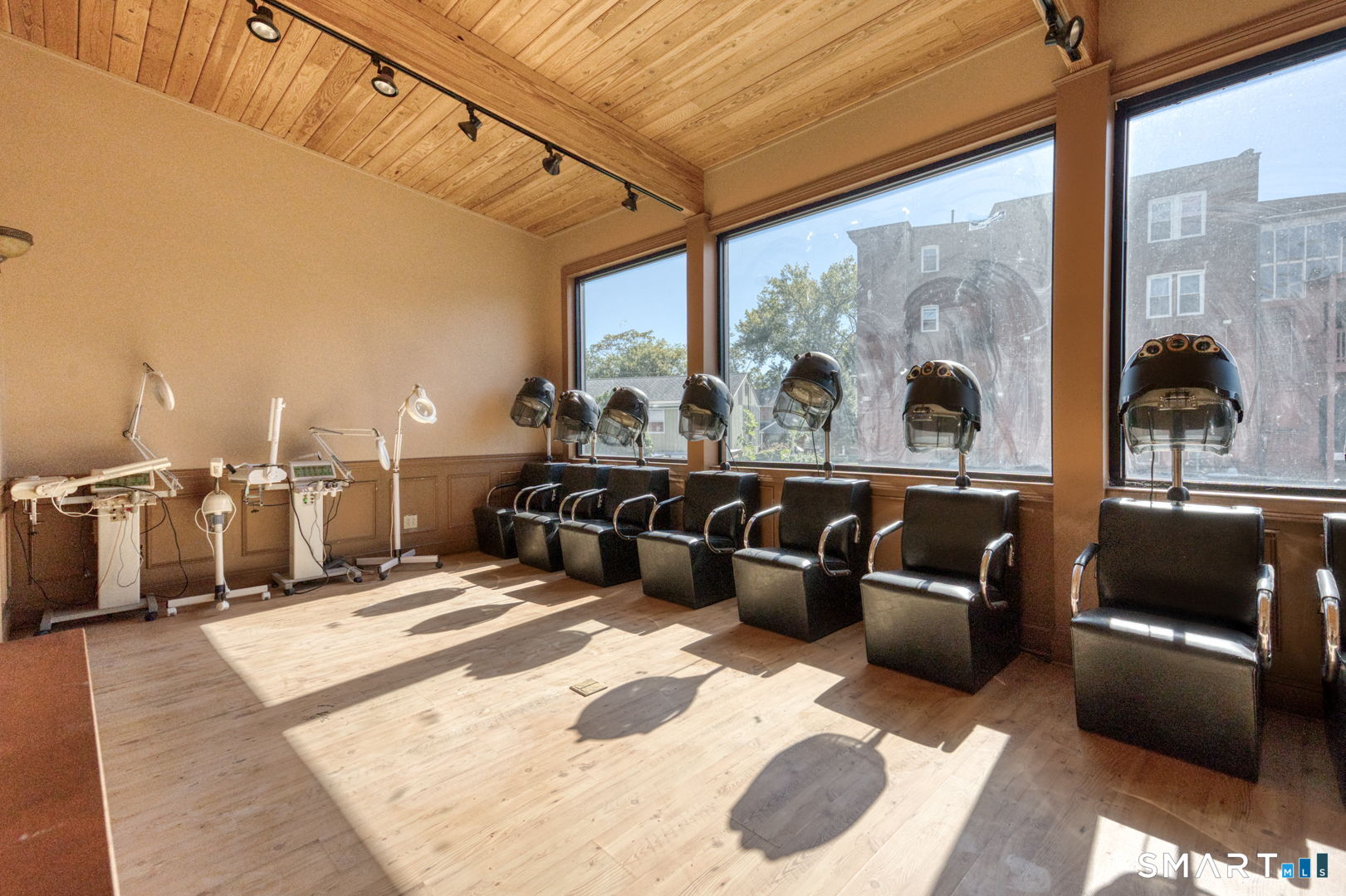 2404 Main Street Hartford, CT 06120 - Photo 17 of 37 a living room with furniture and a floor to ceiling window