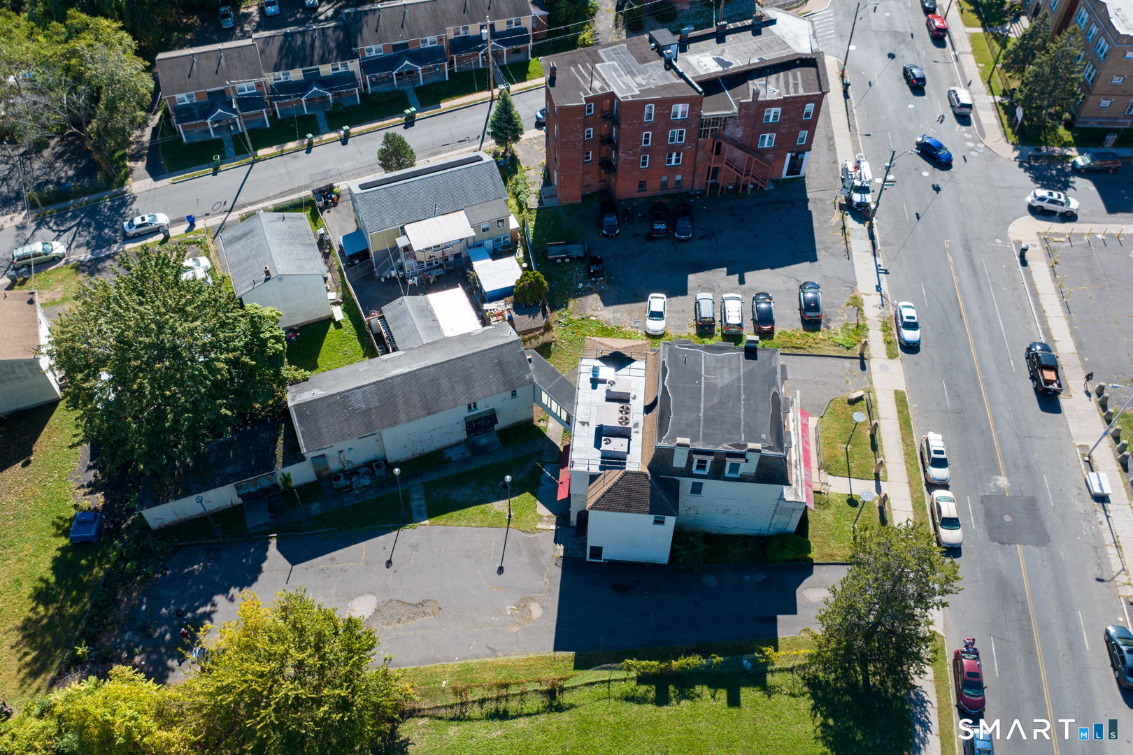 2404 Main Street Hartford, CT 06120 - Photo 2 of 37 an aerial view of multiple houses with outdoor space