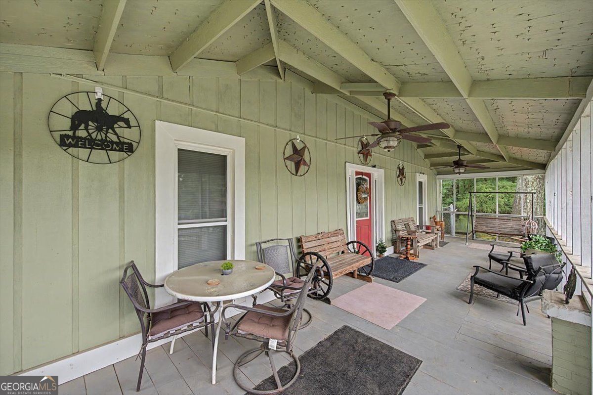 483 Coal Road Northwest Resaca, GA 30735 - Photo 7 of 56 a living room with furniture and a window