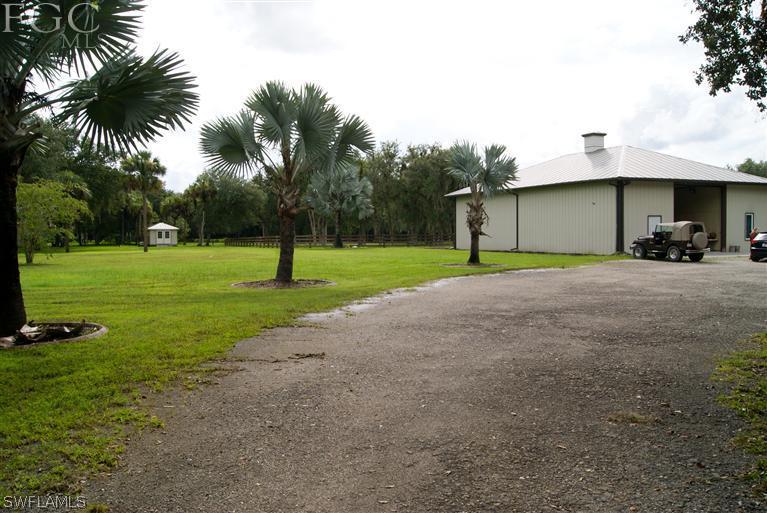 17180 Frank Road Alva, FL 33920 - Photo 17 of 23 a view of a park with a car parked