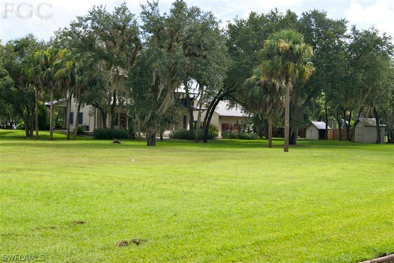 17180 Frank Road Alva, FL 33920 - Photo 18 of 23 a house view with swimming pool
