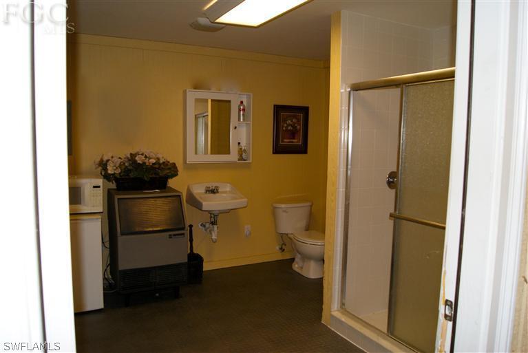 17180 Frank Road Alva, FL 33920 - Photo 21 of 23 a bathroom with a sink and a toilet