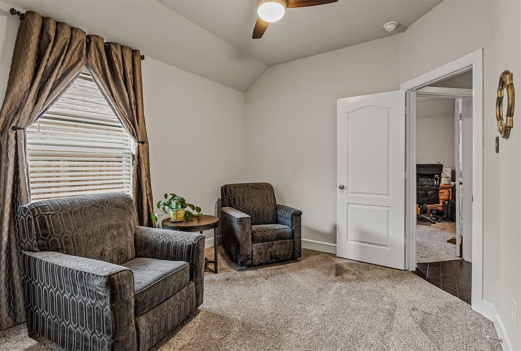 2064 Glaston Road Forney, TX 75126 - Photo 18 of 36 a living room with furniture and a window