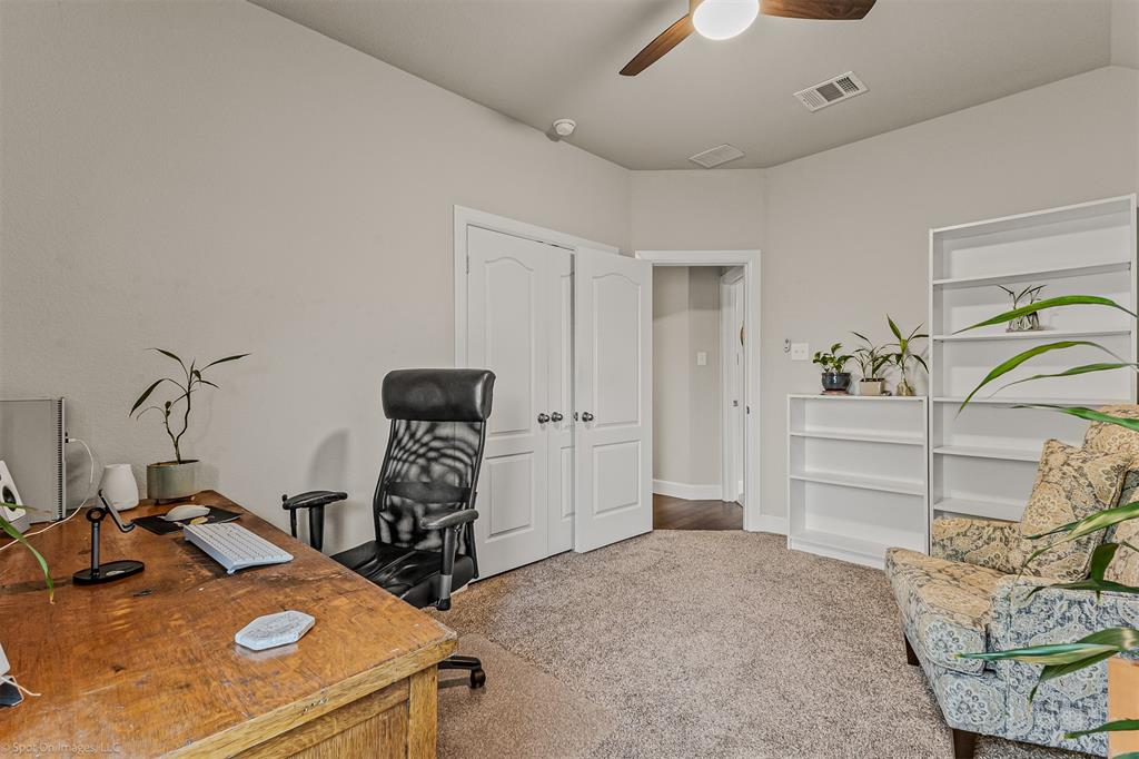 2064 Glaston Road Forney, TX 75126 - Photo 22 of 36 a room with storage and utility