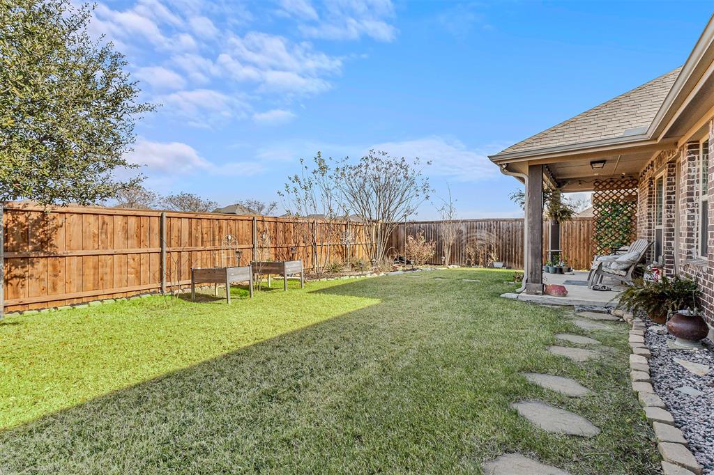 2064 Glaston Road Forney, TX 75126 - Photo 27 of 36 a view of a backyard