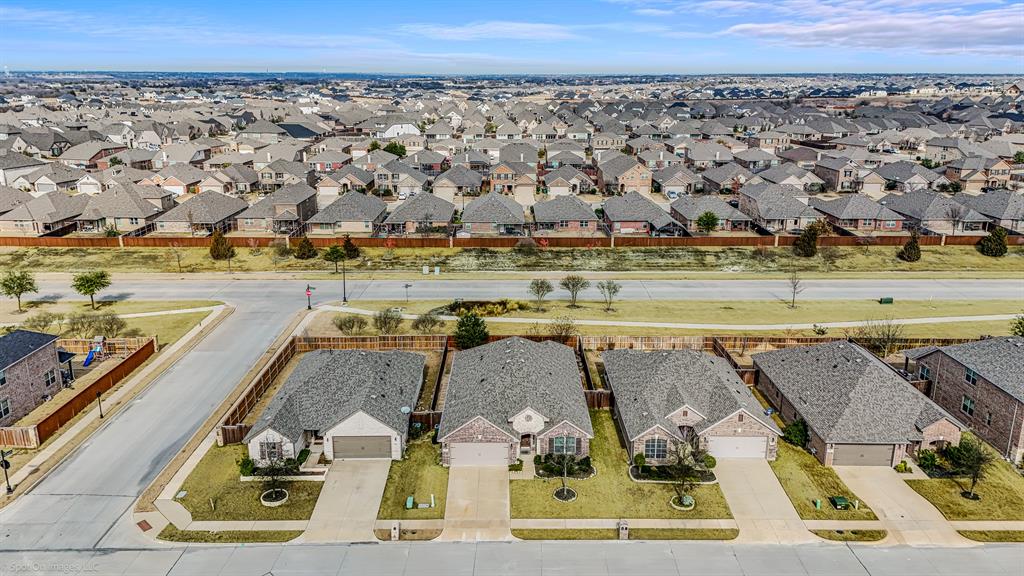 2064 Glaston Road Forney, TX 75126 - Photo 31 of 36 an aerial view of a swimming pool