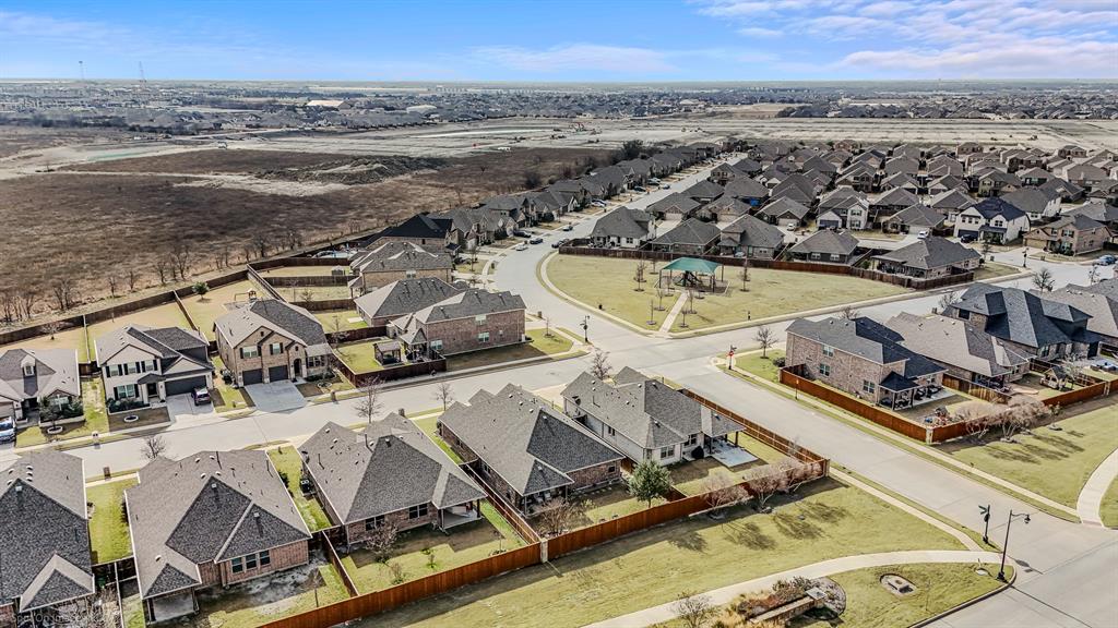 2064 Glaston Road Forney, TX 75126 - Photo 33 of 36 an aerial view of a house with a ocean
