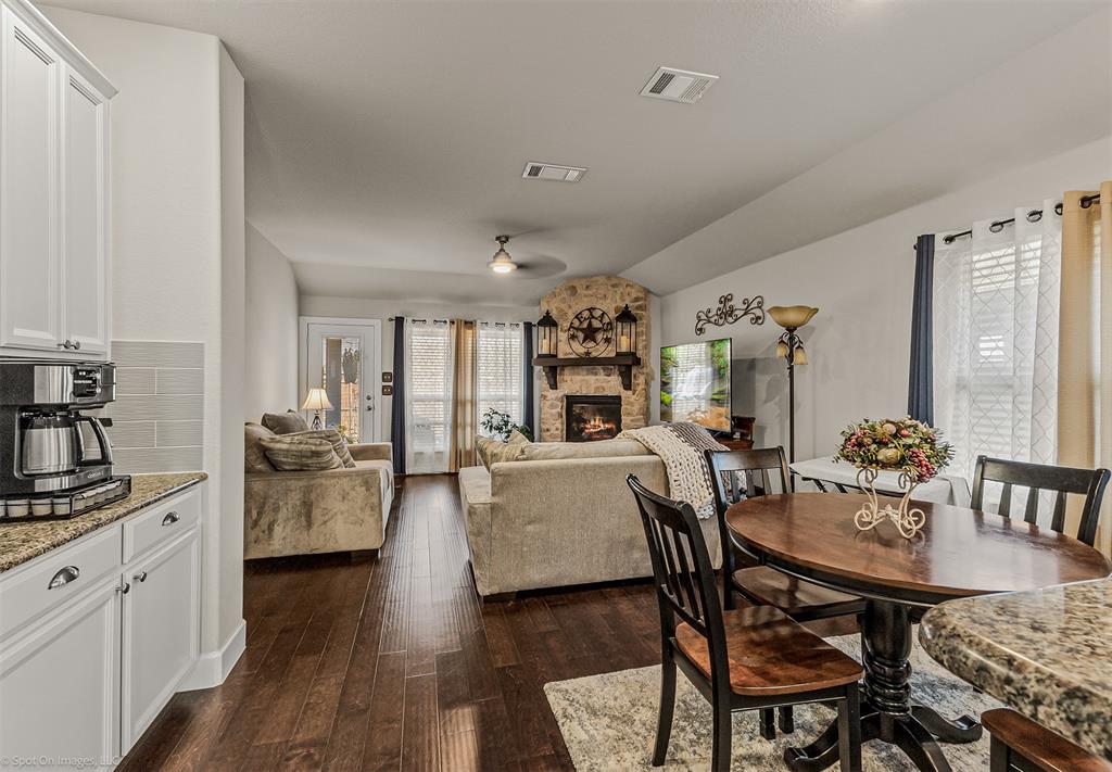 2064 Glaston Road Forney, TX 75126 - Photo 7 of 36 a living room with furniture and wooden floor