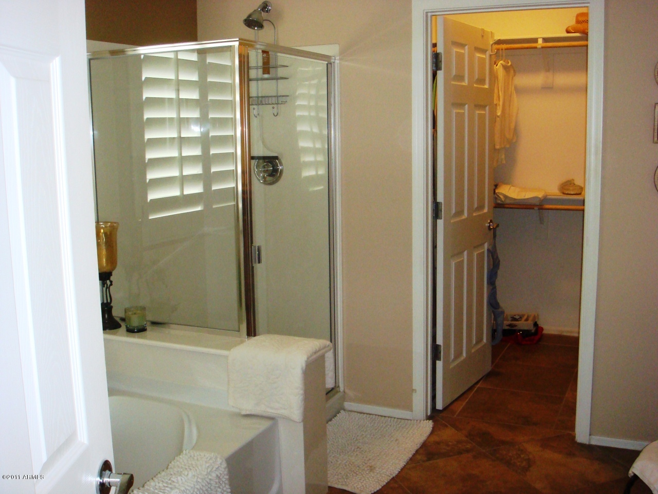4724 West Maldonado Road Laveen, AZ 85339 - Photo 23 of 38 Master bath and walk in closet