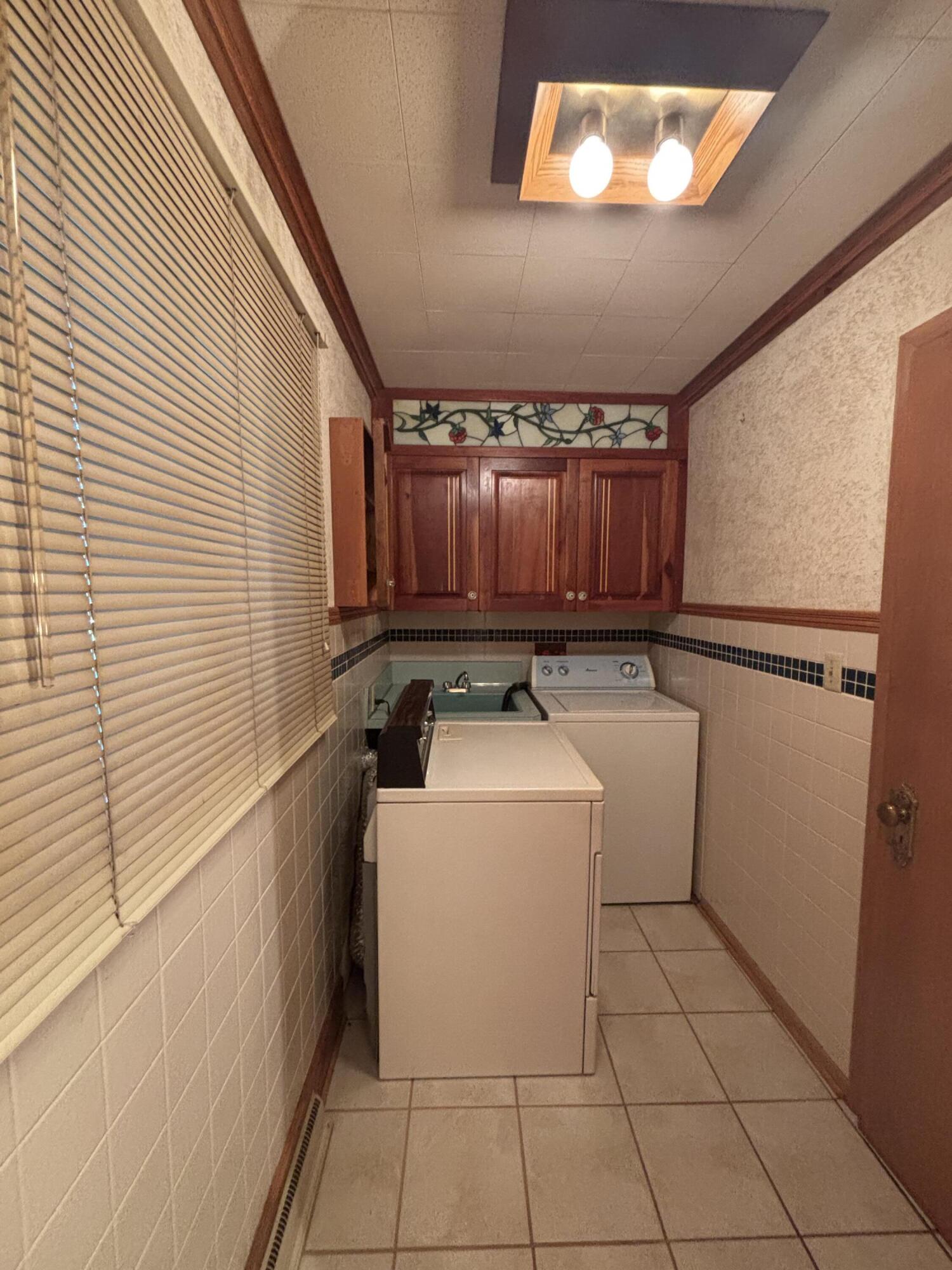 1701 West Donges Bay Road Mequon, WI 53092 - Photo 13 of 29 1st Fl Laundry Rm
