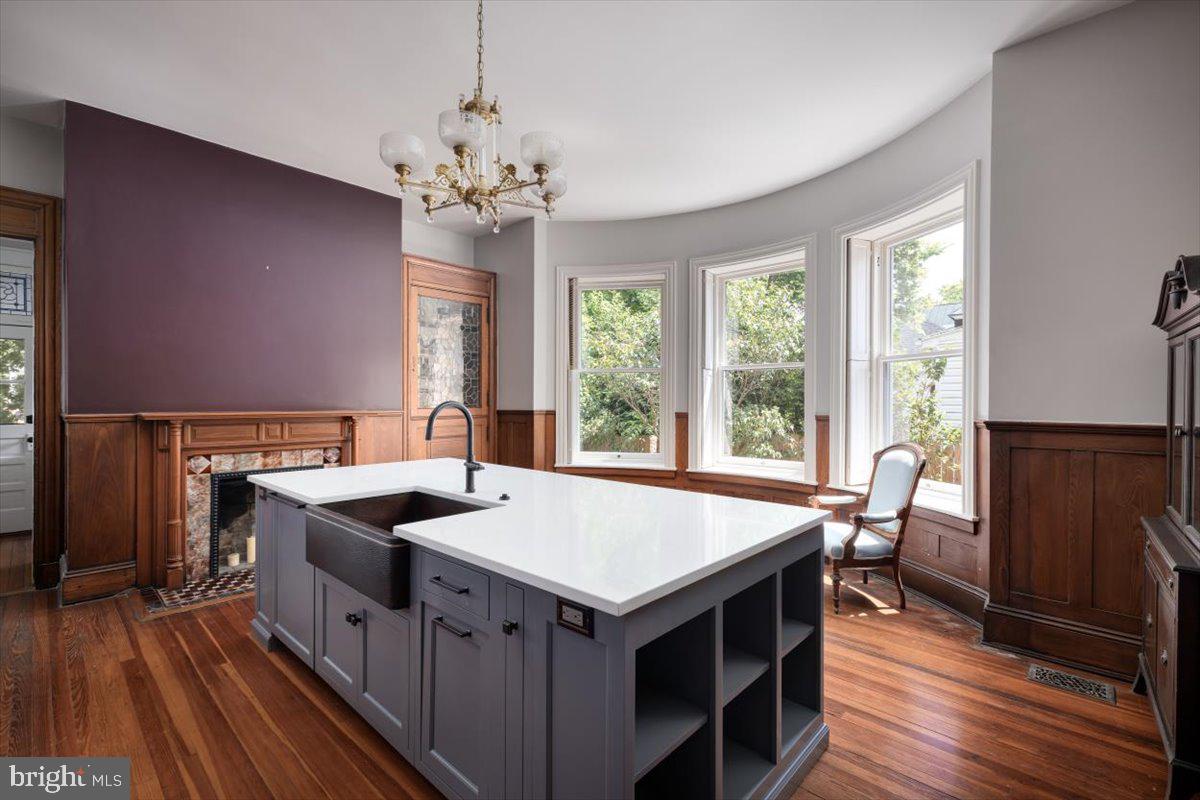 202 South Washington Street Winchester, VA 22601 - Photo 23 of 71 a kitchen that has a table and chairs in it