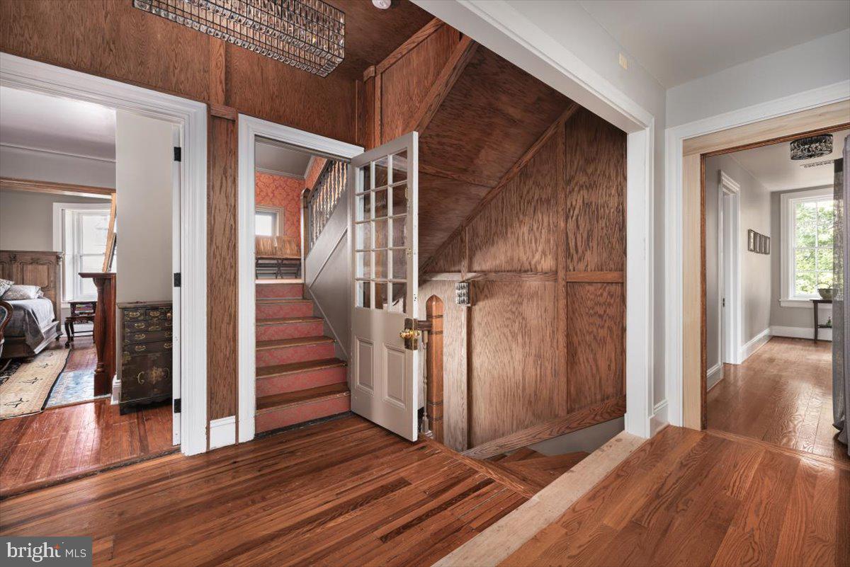 202 South Washington Street Winchester, VA 22601 - Photo 33 of 71 a view of a hallway view with wooden floor and staircase