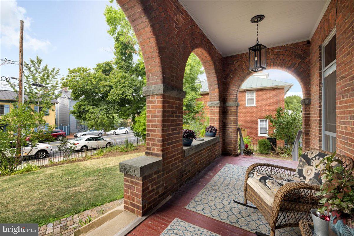 202 South Washington Street Winchester, VA 22601 - Photo 5 of 71 a view of swimming pool with outdoor seating
