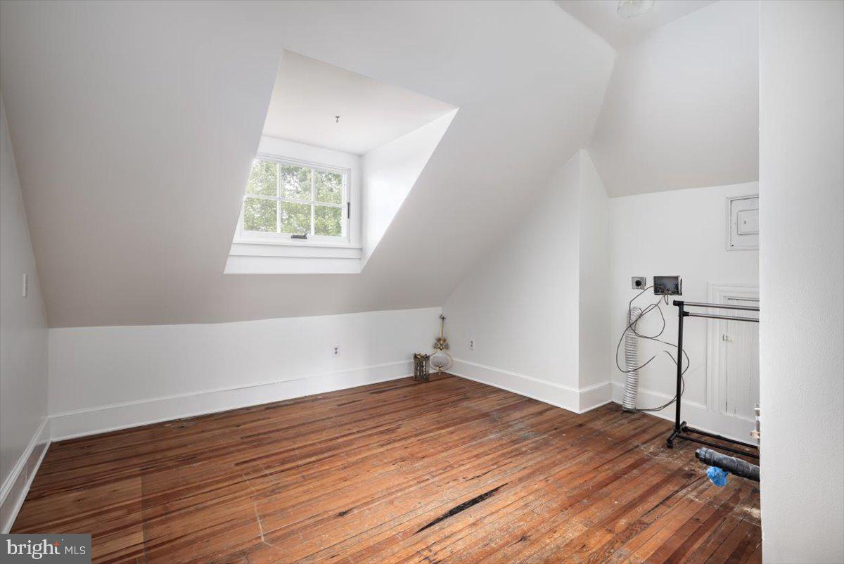 202 South Washington Street Winchester, VA 22601 - Photo 51 of 71 a view of a room with wooden floor and window
