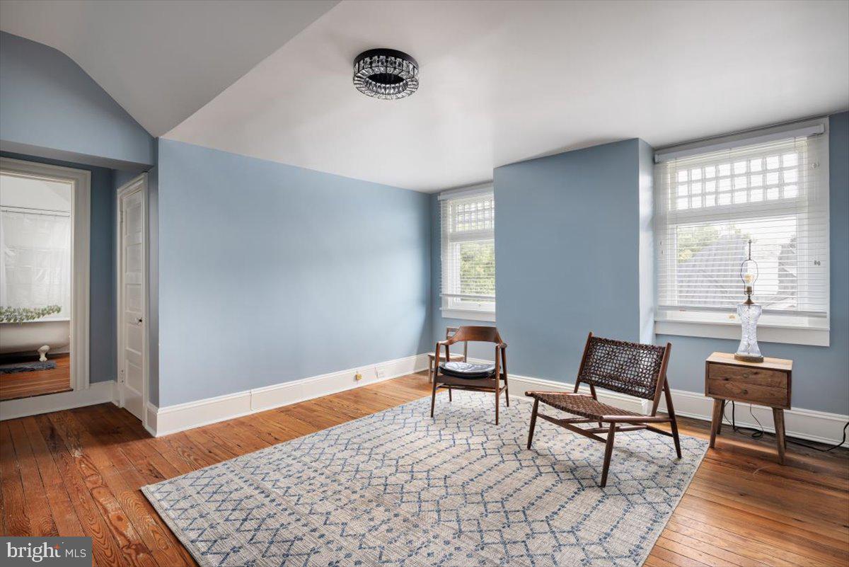 202 South Washington Street Winchester, VA 22601 - Photo 52 of 71 a living room with furniture and a window
