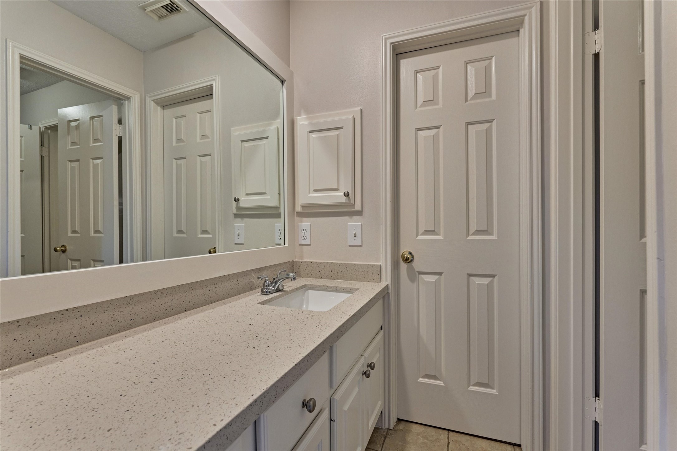16707 Avenfield Road Tomball, TX 77377 - Photo 28 of 50 a bathroom with a sink and a mirror