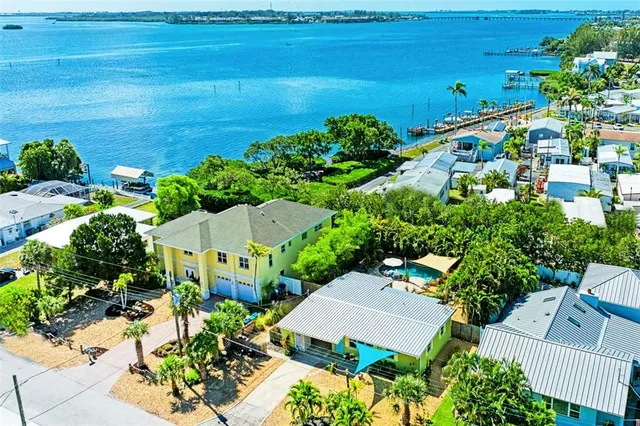 an aerial view of a house with a garden