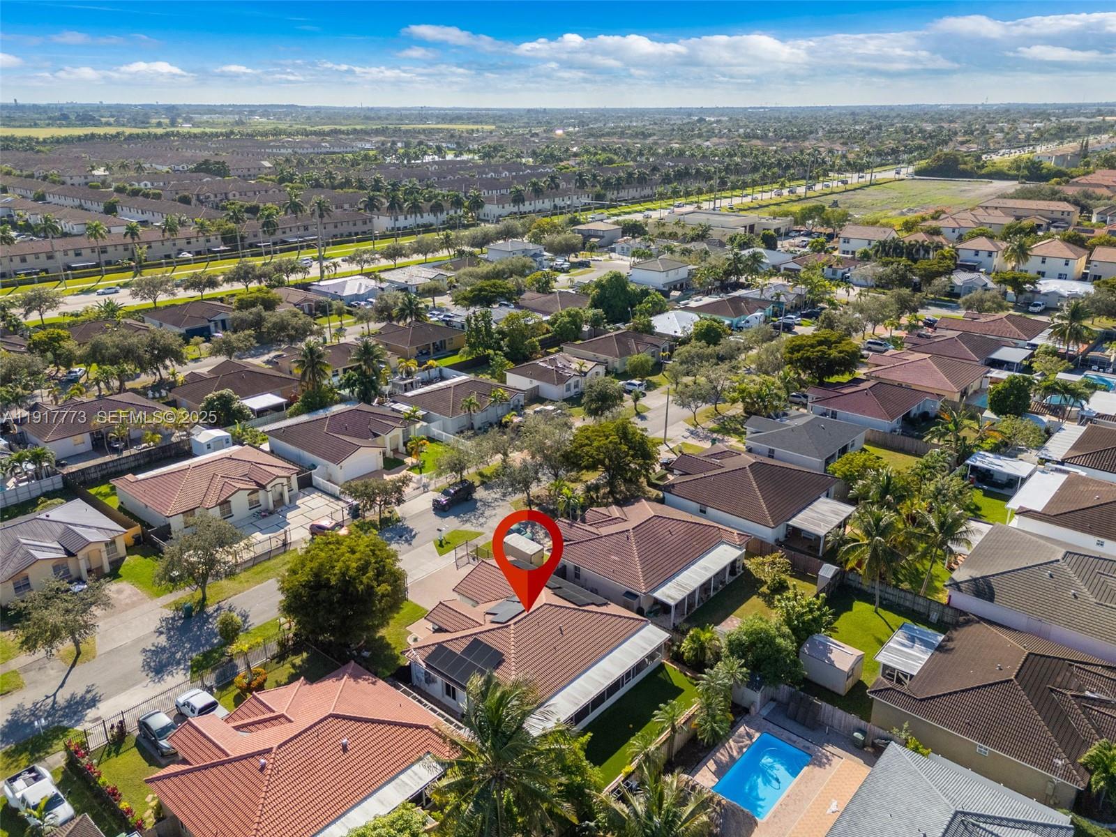 11347 Southwest 246th Terrace Homestead, FL 33032 - Photo 37 of 40 an aerial view of residential houses with outdoor space