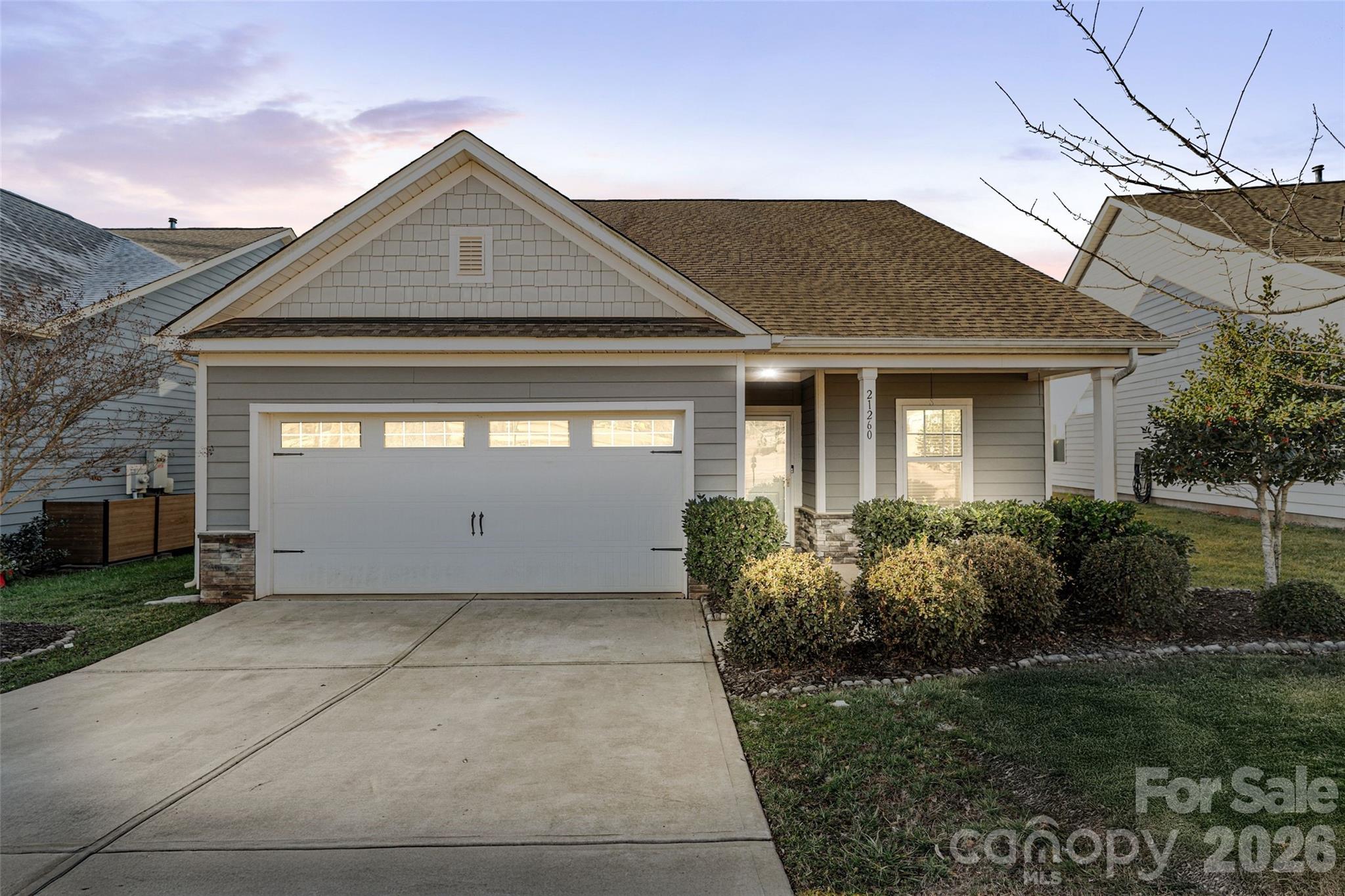 21260 Sanctuary Drive Lancaster, SC 29720 - Photo 1 of 44 a front view of a house with garden