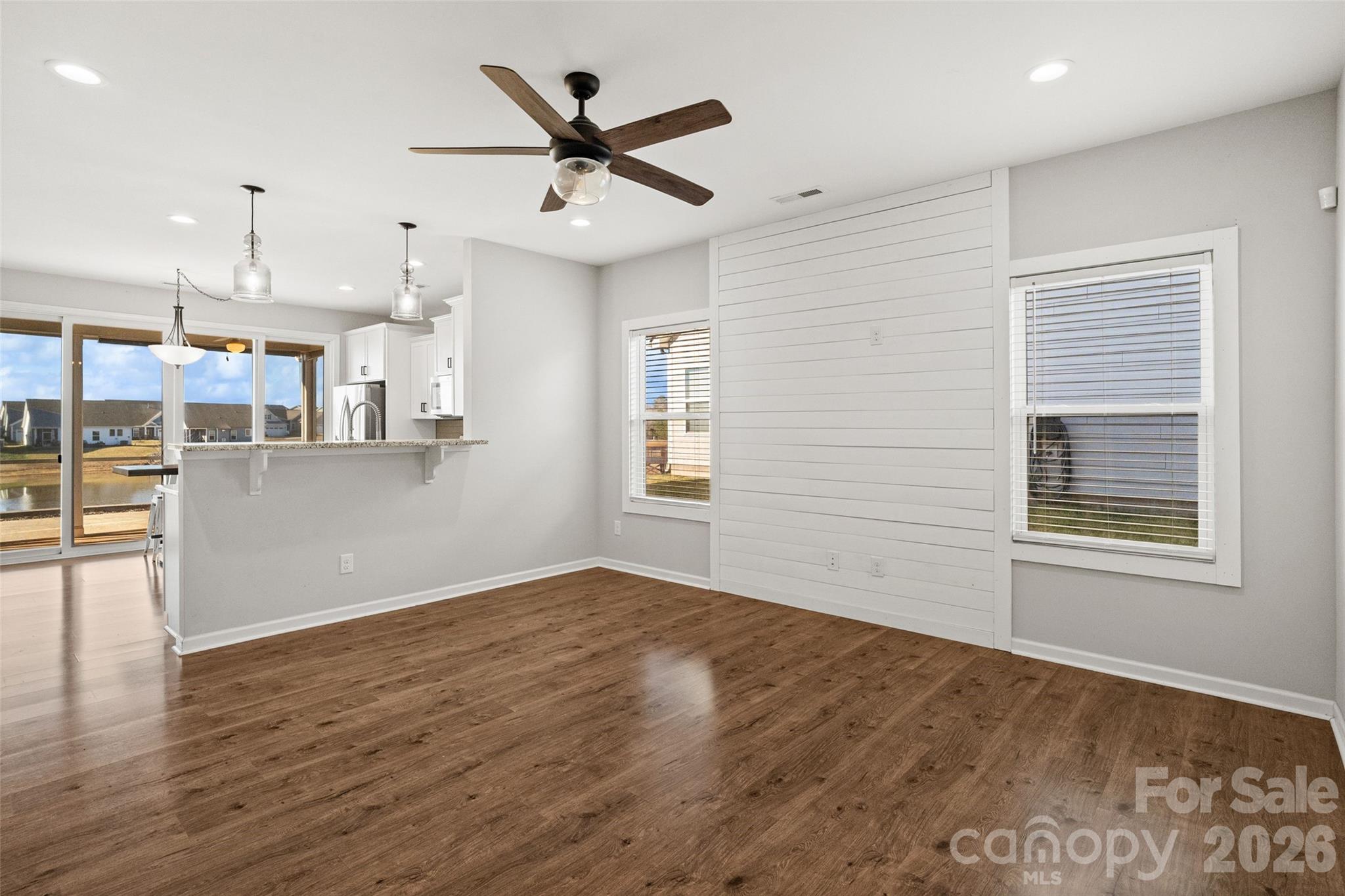 21260 Sanctuary Drive Lancaster, SC 29720 - Photo 14 of 44 a view of a kitchen with furniture and wooden floor