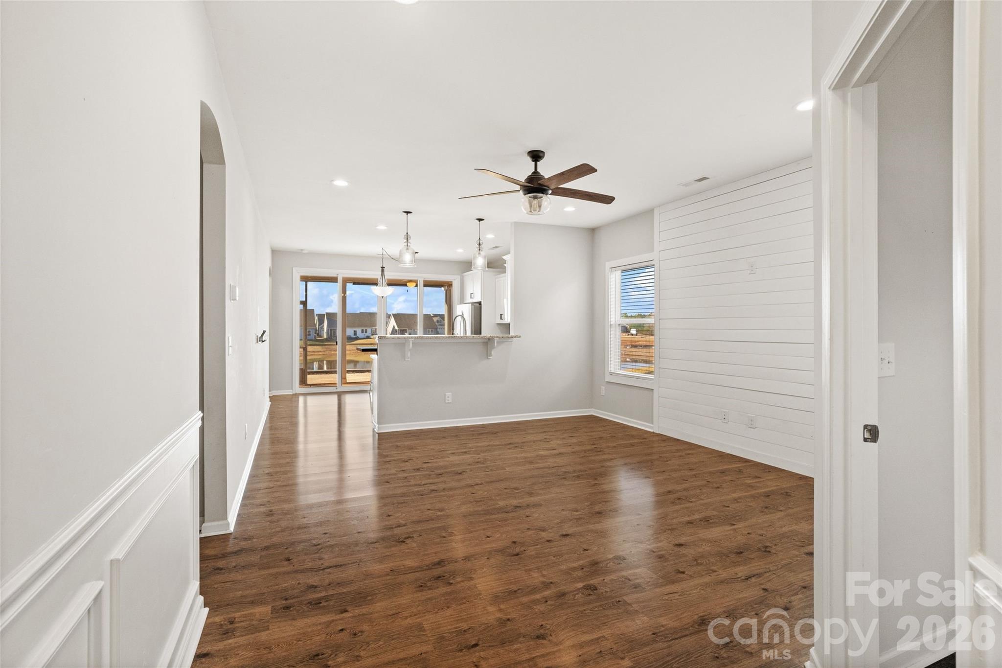 21260 Sanctuary Drive Lancaster, SC 29720 - Photo 15 of 44 a view of a kitchen with a sink and wooden floor
