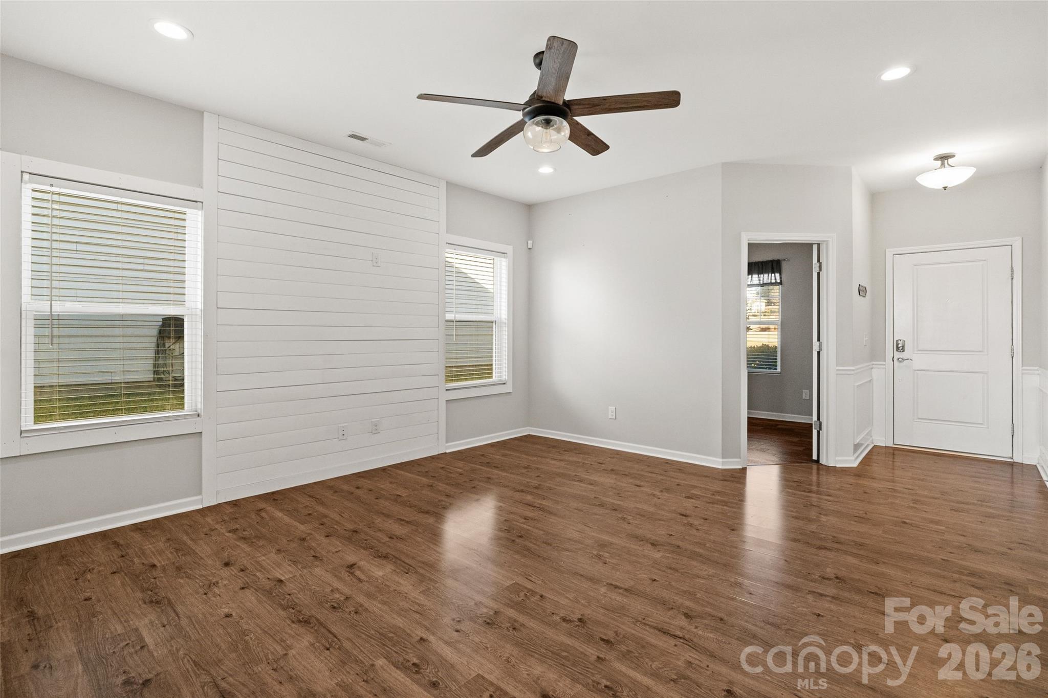 21260 Sanctuary Drive Lancaster, SC 29720 - Photo 18 of 44 a view of empty room with wooden floor and window
