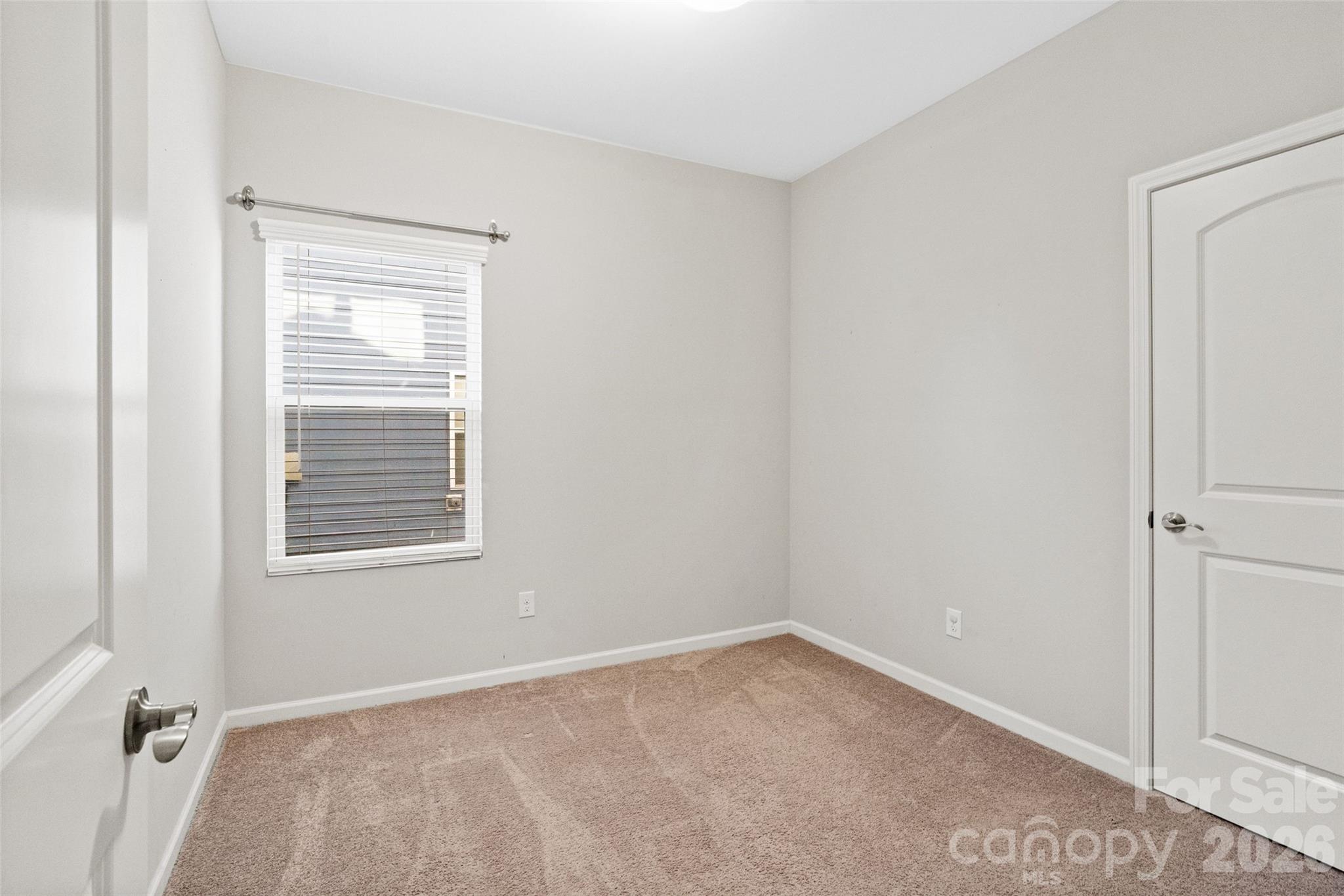 21260 Sanctuary Drive Lancaster, SC 29720 - Photo 21 of 44 a view of an empty room with a window