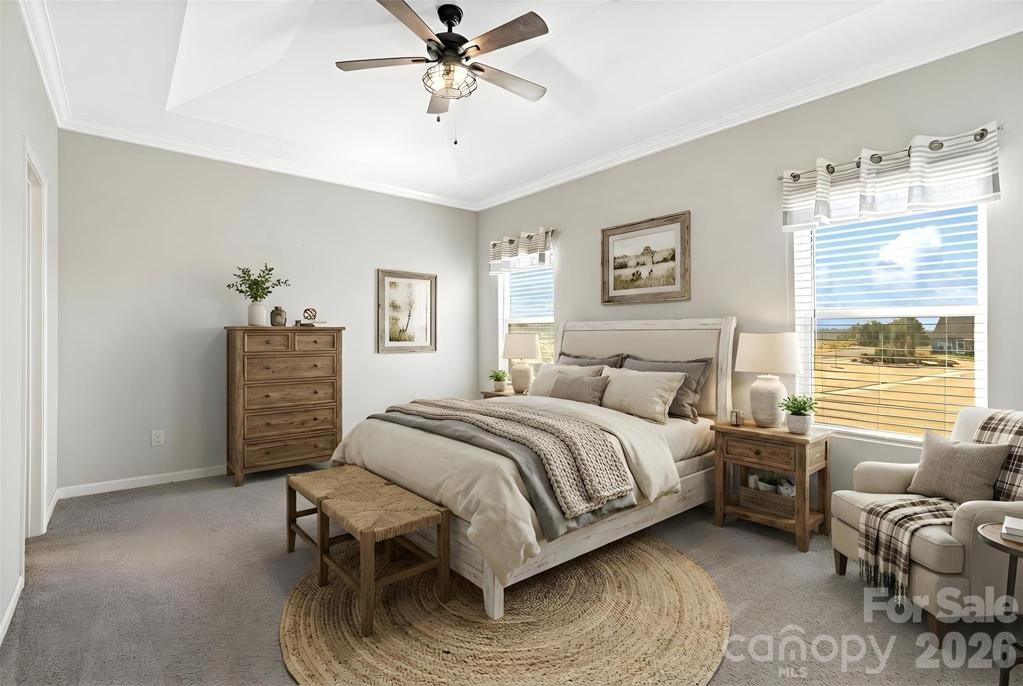 21260 Sanctuary Drive Lancaster, SC 29720 - Photo 24 of 44 a bedroom with a bed a couch and a window