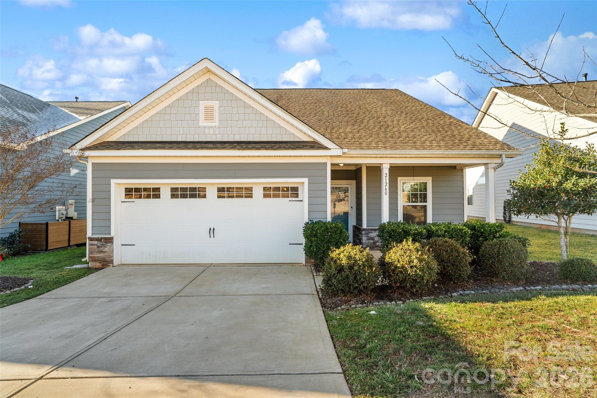 21260 Sanctuary Drive Lancaster, SC 29720 - Photo 3 of 44 a front view of a house with garden