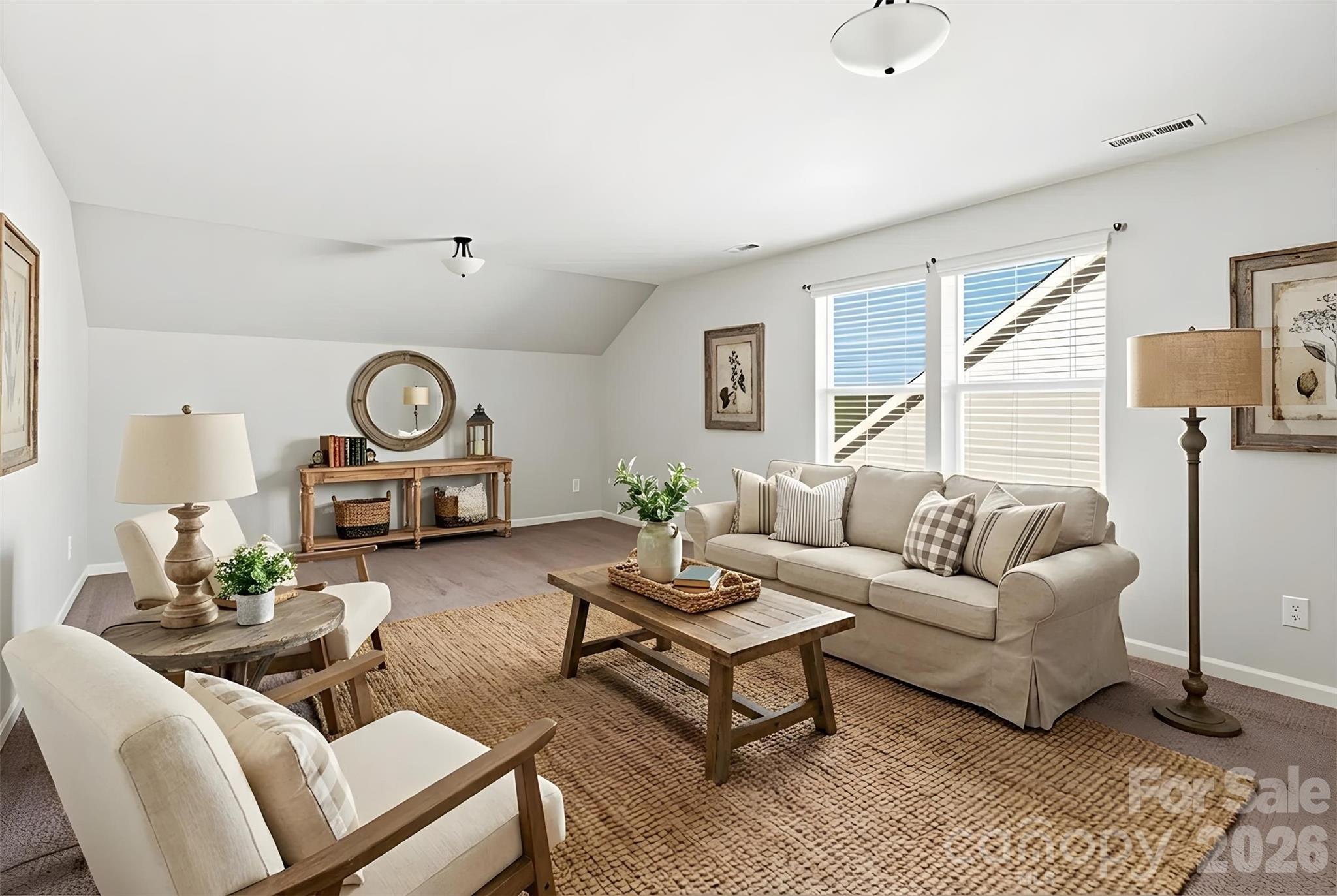 21260 Sanctuary Drive Lancaster, SC 29720 - Photo 31 of 44 a living room with furniture and a wooden floor