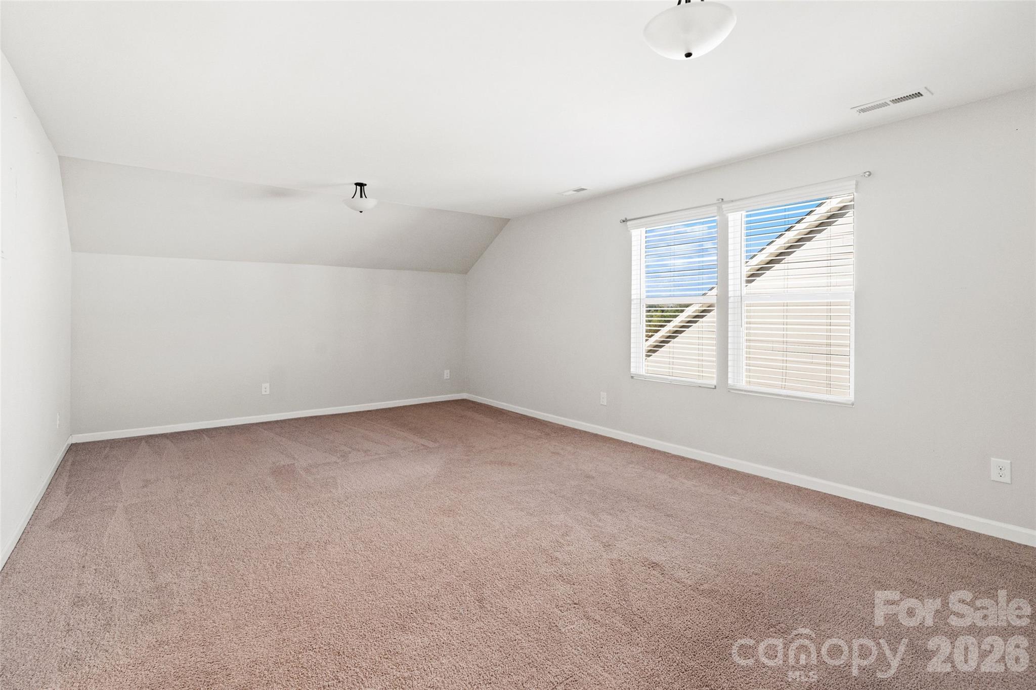 21260 Sanctuary Drive Lancaster, SC 29720 - Photo 32 of 44 an empty room with a window