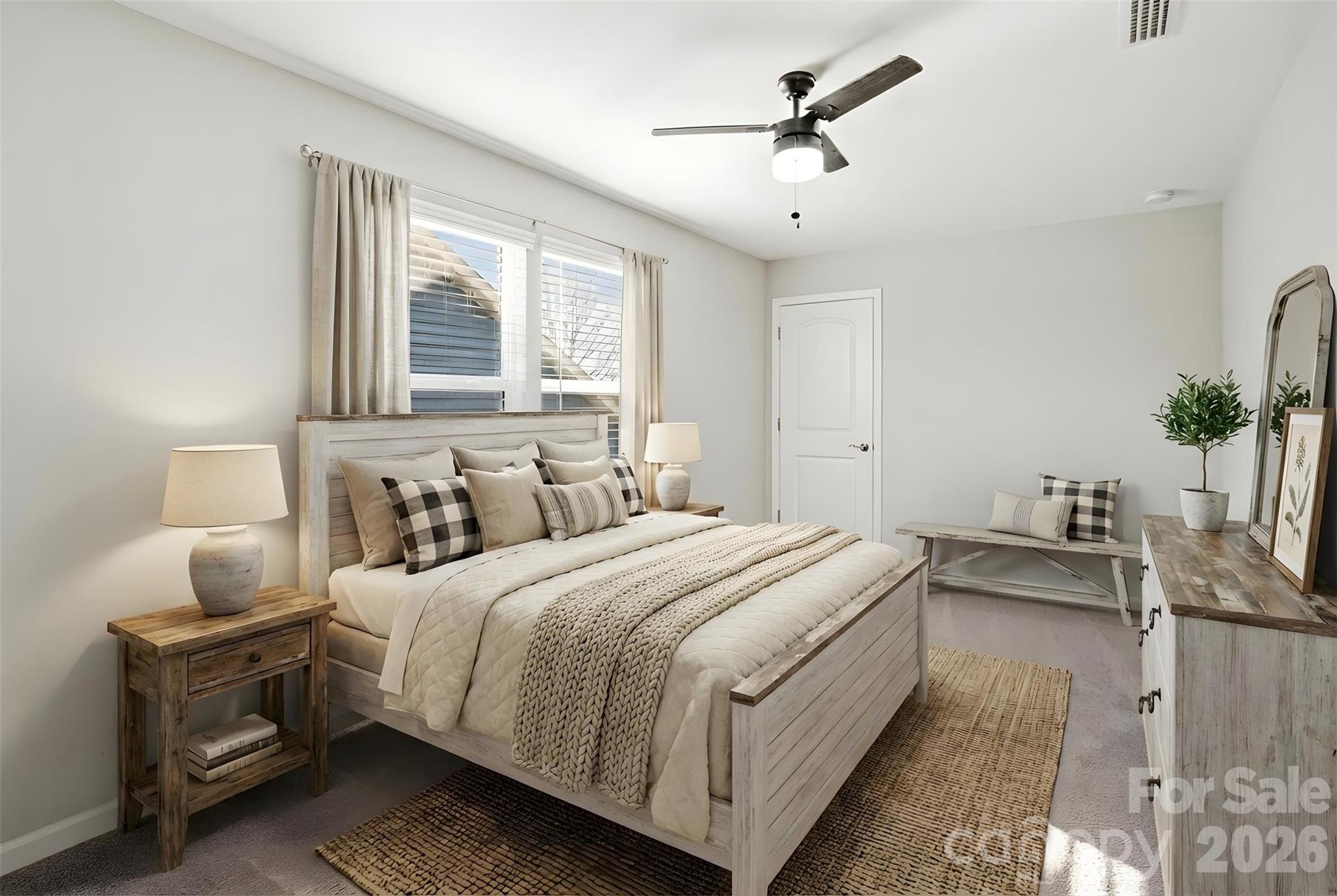 21260 Sanctuary Drive Lancaster, SC 29720 - Photo 33 of 44 a bedroom with bed and window
