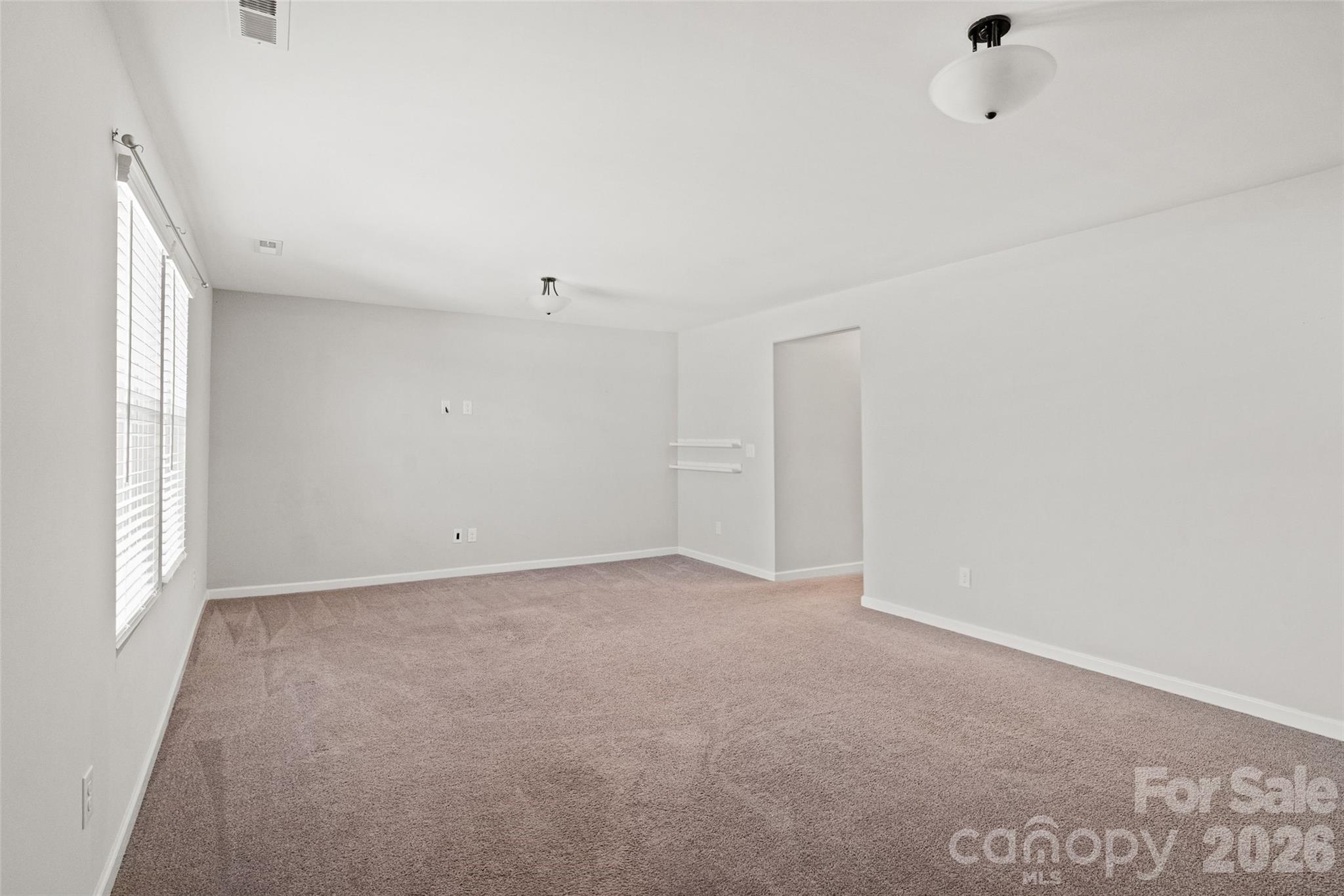 21260 Sanctuary Drive Lancaster, SC 29720 - Photo 35 of 44 a view of an empty room with a window