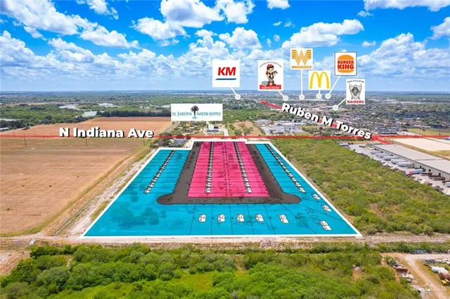 a view of swimming pool with an outdoor seating