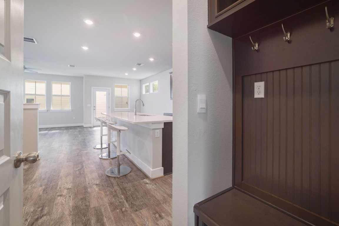 7607 Eckington Street, Unit 235 Austin, TX 78744 - Photo 11 of 37 a view of a room with wooden floor and a window