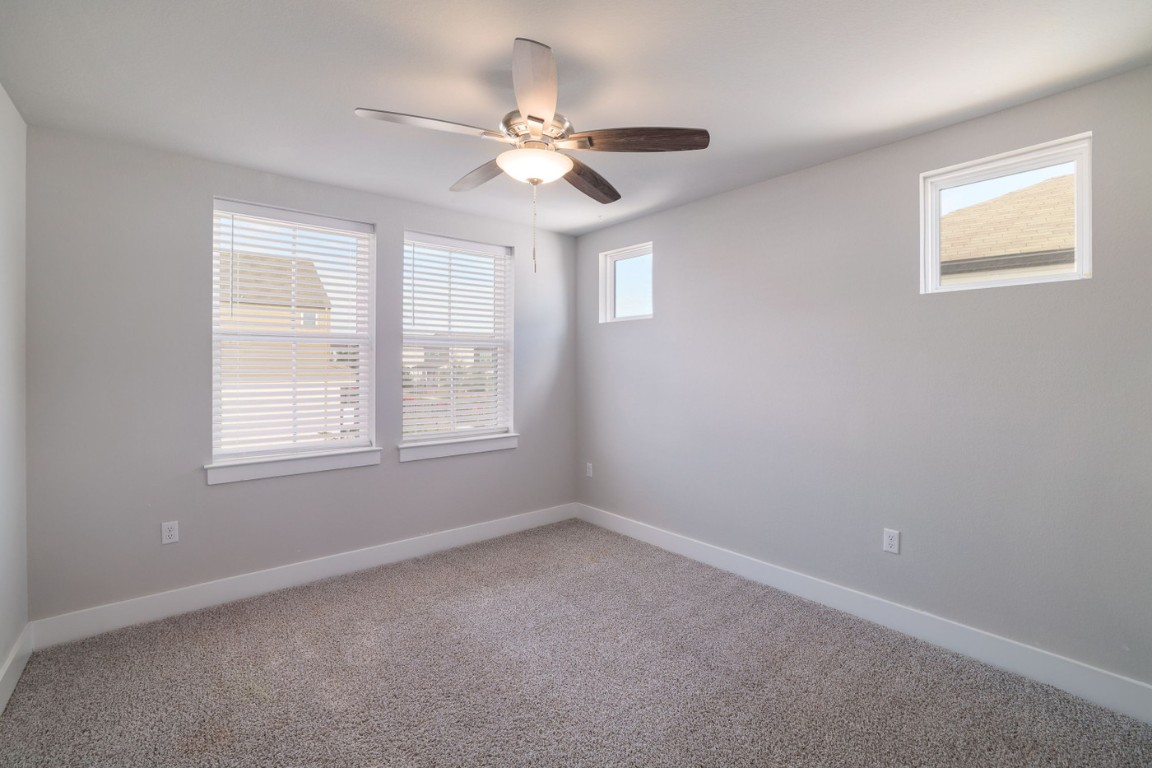 7607 Eckington Street, Unit 235 Austin, TX 78744 - Photo 21 of 37 a view of an empty room with a window