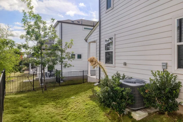 front view of a house with a garden
