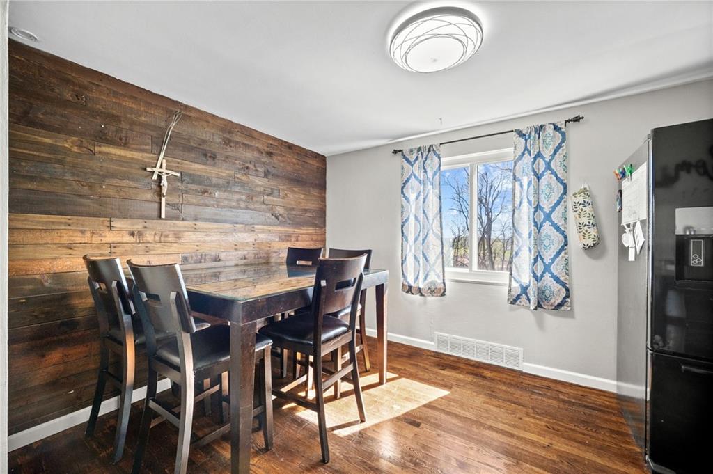 4030 Lebanon Church Road West Mifflin, PA 15122 - Photo 11 of 45 a view of a dining room with furniture and wooden floor