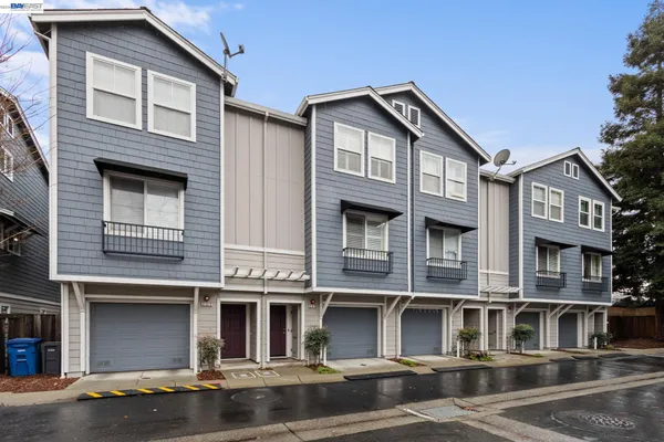 a front view of residential houses
