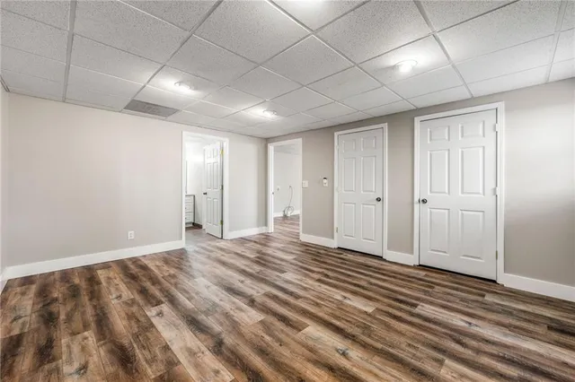 a bedroom with a bed and a table