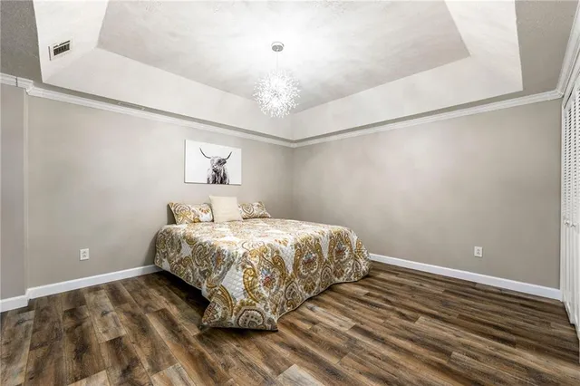 a view of a park with large trees