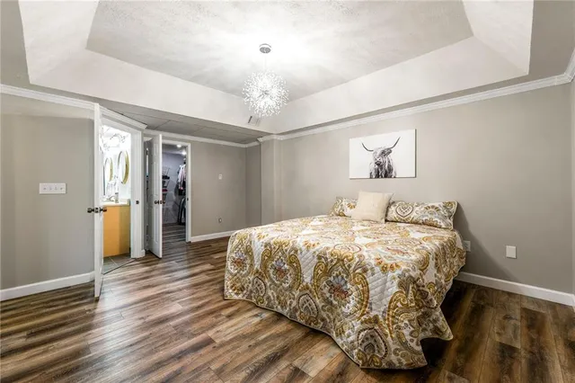 a view of a lake with houses in the background