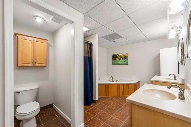 a view of a swimming pool with an outdoor space and seating area