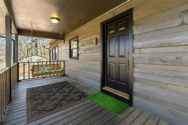 a view of a house with a yard and garage