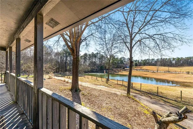 a kitchen with stainless steel appliances granite countertop sink stove top oven and cabinets