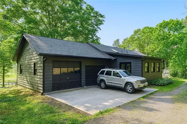 a kitchen with stainless steel appliances granite countertop a stove and a refrigerator