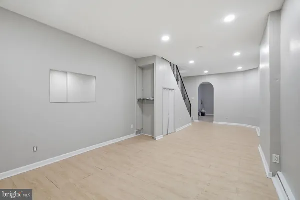 a view of a livingroom with a staircase